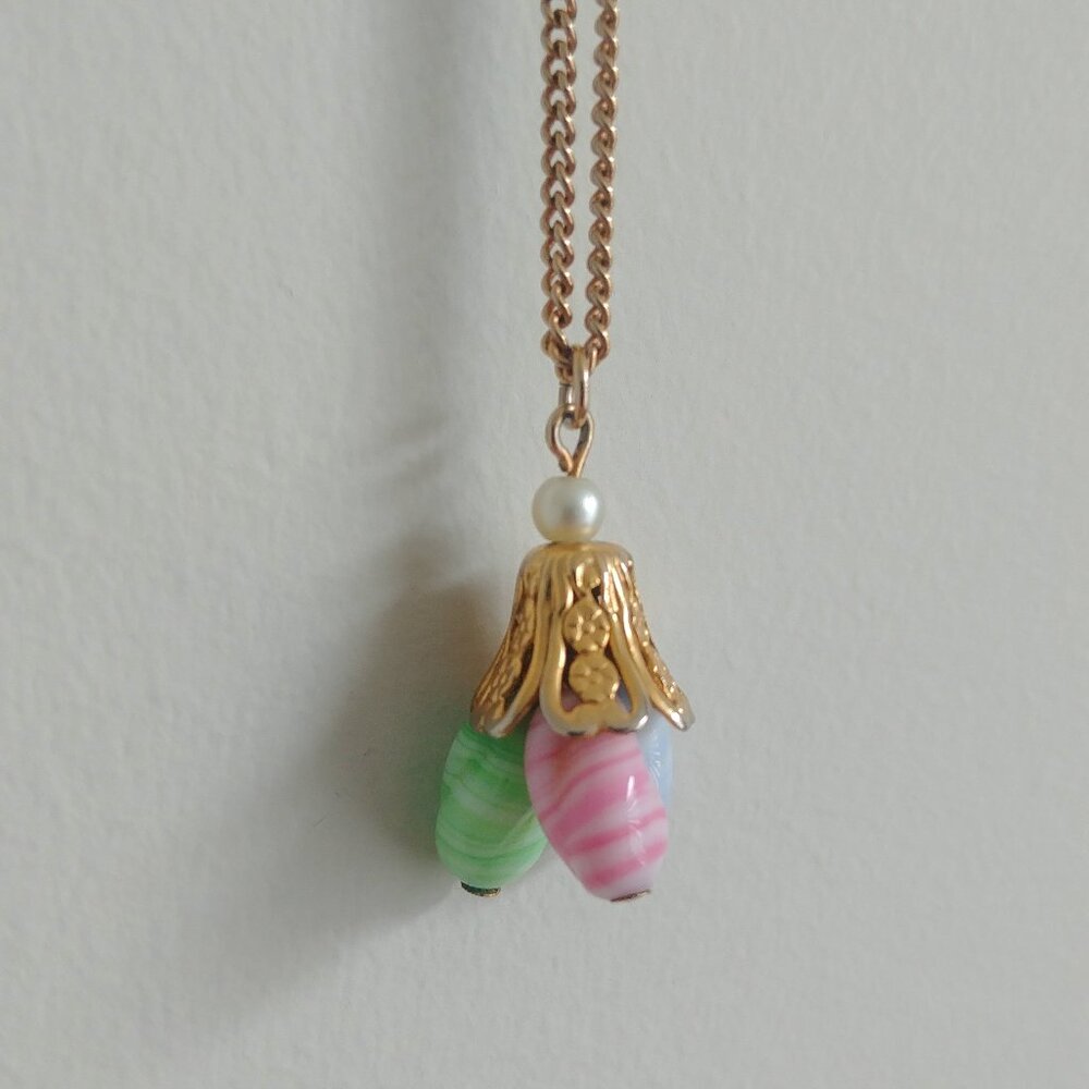 Short gold tone necklace with blue pink green pearl pendant